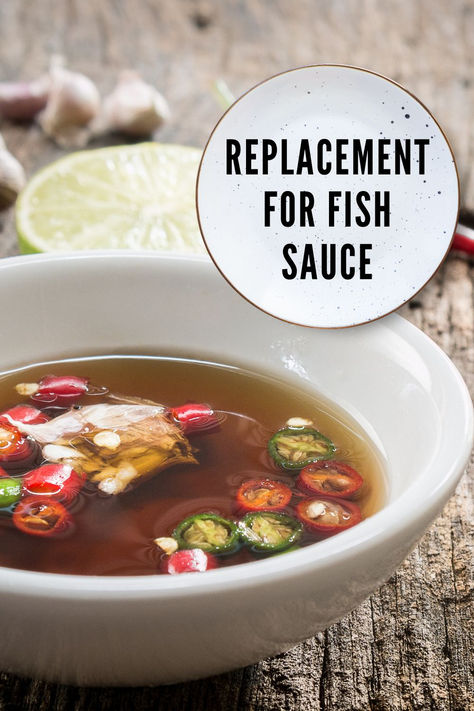 A bowl of fish sauce on a wooden table. Substitute For Fish Sauce, Fish Sauce Substitute, Vegetarian Fish Sauce, Vegan Fish Sauce, Vietnamese Fish, Recipes With Fish Sauce, Gluten Free Fish, Bunny Chow, Cooking Substitutions