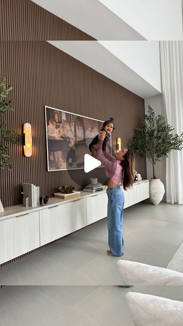 𝐉𝐄𝐒𝐒𝐈 𝐌𝐀𝐋𝐀𝐘 on Instagram: "🪵 UNBOXING our new walnut fluted wall panels from @thewoodveneerhub for our family room! 🪵 We knew we wanted to warm up this space but didn’t want to break the bank, and we were able to DIY this project ourselves! Watch to see how you can too! ☝🏽 Comment LINK and I’ll send you a direct link to the exact panels we used!" Fluted Living Room, Wall Fluted Panel Design, Fluted Wall Panel Living Rooms, Diy Fluted Wall, Fluted Wall Panel, Jessi Malay, Fluted Panel, Fluted Wall, September 19