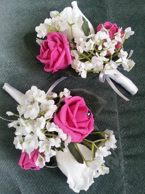 Buttonholes in Hot Pink with white gypsophila, rosebud and crystal Hot Pink And White Corsage, White Corsage, Prom Flowers Corsage, Pink Boutonniere, Corsage And Boutonniere Set, Christmas Dance, Corsage Prom, Corsage And Boutonniere, Flower Corsage