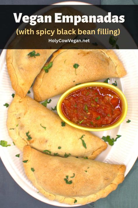 These incredibly flavorful vegan empanadas have a flaky, crispy wrapper encasing a spicy filling of black beans, potatoes and more veggies. They are baked, not fried. Serve with a zesty salsa for a filling snack or meal! Vegan Empanadas, Vegan Info, Beans Potatoes, Beans Recipes, Vegan Sandwiches, Vegan Queso, Vegetarian Mexican, Vegan Mexican Recipes, More Veggies