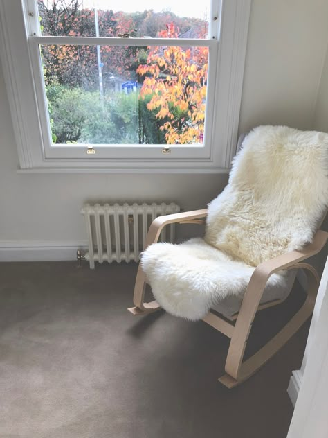 Nursing chair,  Ikea Poang Rocker, Nursery Neutrals, Buttermilk Sheepskin Rug Nursing Chair Ikea, Ikea Yellow Chair, Ikea Sheepskin Rug, Ikea Rocking Chair, Ikea Sheepskin, Ideas For Baby Room, Rocker Nursery, Nursing Chairs, Baby Bedroom Furniture