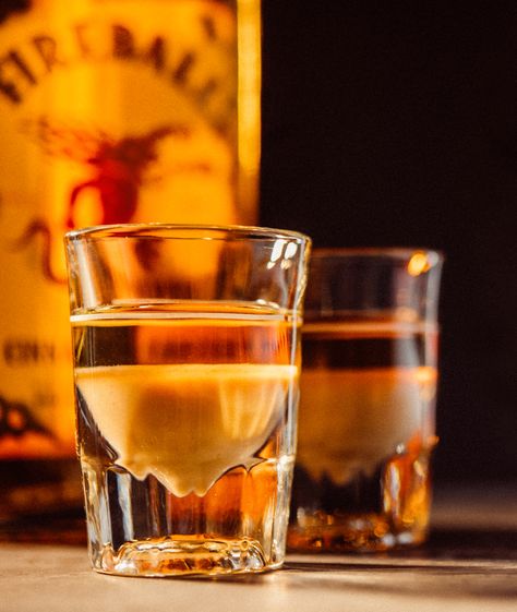 Taste the fiery kick of Fireball in Fire Alarm. Find out how to make this red hot mixed drink here. Hot Mixed Drinks, Fireball And Cream Soda, Fireball Mixed Drinks, Fireball Whiskey Recipes, Whisky Recipes, Fireball Shots, Fireball Recipes, Drinks To Make At Home, Fireball Shot