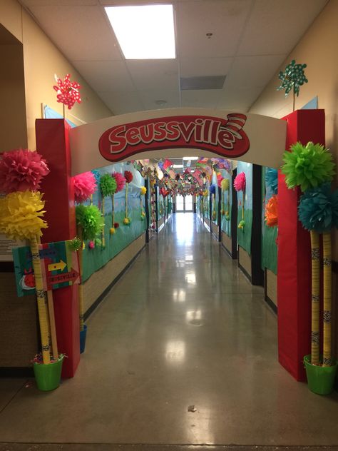 Seussville Hallway decorated by parents and teachers Dr Seuss Room Transformation, Dr Seuss Door Decorating Ideas Teachers, Kindergarten Prom, Dr Seuss Door Decorations, Dr Seuss Bulletin Board Ideas, Dr Seuss Classroom Theme, Dr. Suess, Dr Seuss Classroom Door, Dr Seuss Decorations