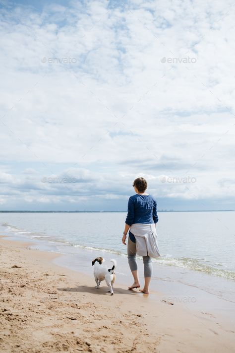 Woman walking with her dog on the sandy beach. Rear view. - Stock Photo - Images Sunny Summer Day, Photography Genres, Creative Infographic, Brand Shoot, Woman Walking, No Shoes, Dog Walk, Photography Pics, Photography Kit