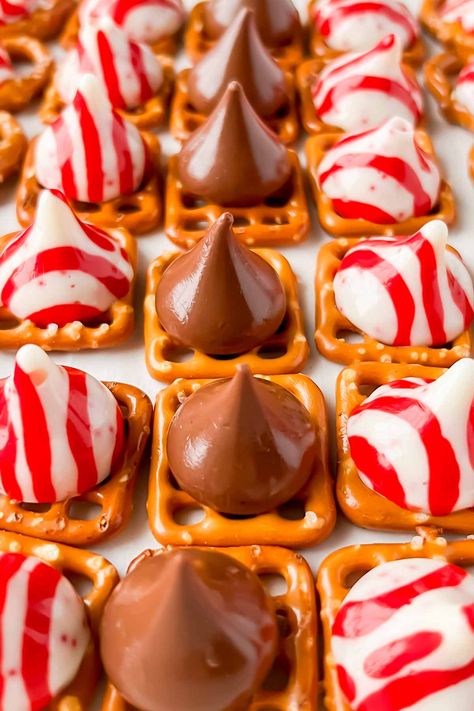 I mean this holiday sweet and salty treat is silly easy! Just a few ingredients to make these Pretzel Hershey Kiss M&M treats and everyone loves them! Hershey Kiss And Pretzel Treats, Waffle Pretzel Treats Hershey's Kisses, Pretzel Kisses Treats, Pretzels And Hershey Kisses, M M Pretzels Hershey's Kisses, M&m Pretzels, Pretzel And M&m Treats, Pretzel With Hershey Kiss And M&m, Pretzel And Hershey Kiss Treats