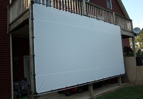 On the House-framed tarp screen for outdoor movies Projector Screen Diy, Diy Outdoor Movie Screen, Outdoor Projector Screen, Backyard Movie Theaters, Outside Movie, Diy Projector, Outdoor Movie Theater, Outdoor Movie Screen, Backyard Movie Nights