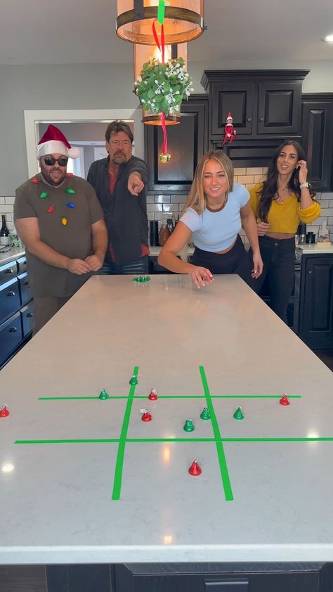 Tic Tac Mistletoe 😂 | Instagram Holiday Minute To Win It Games Family Christmas, Flip Cup Tic Tac Toe Game, Office Holiday Party Ideas Games For Adults, Thanksgiving Relay Games, Christmas Themed Minute To Win It Games, Tik Tok Christmas Games, Tik Tok Family Games, Christmas Relay Race, Fun Family Holiday Games