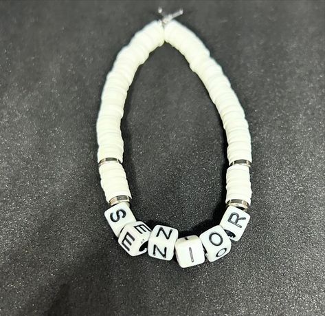 Senior (High School) Heishi Bracelet #handmadebracelet #heishibracelets #beadedbracelets #bracelets #etsyshop #etsyfinds #etsyseller #etsysellersofinstagram #graduate #graduatestudent #graduated🎓 #graduate #pennfostergraduate #highschoolgraduate #senior #senioryear #classof #classof2025 #classof2024 Handmade White Heishi Beaded Necklaces, White Single Strand Heishi Beads Necklace, Handmade White Heishi Beads Choker, White Heishi Beads Single Strand Jewelry, White Heishi Beads Necklaces Hand-strung, Senior Year, High School Seniors, Handmade Bracelets, Etsy Finds