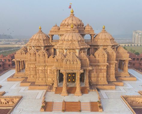 Akshardham Temple stands on the banks of the Yamuna river and though relatively young, is already an icon of Delhi. Know about its location, facts and more Akshardham Temple Delhi, Akshardham Temple, Delhi Tourism, Temple India, Indian Temple Architecture, India Architecture, Ancient Indian Architecture, Amazing India, Asian Architecture