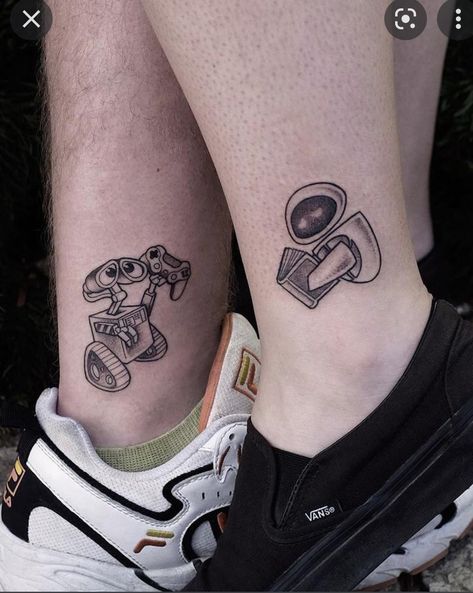 Wall E Couple Tattoo, Eve And Wall E Tattoo, Matching Gamer Tattoos, Couple Tattoos Funny, Dreamworks Tattoo, Wall E Tattoo, Creative Couple Tattoos, Skeleton Couple Tattoo, Disney Tattoos Quotes