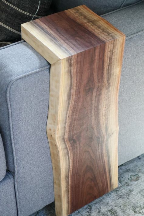 Creation Time: 4-6 weeks  This listing is for one, extra long armrest sofa table. This table will fit right over the arm of your couch or chair. Featured table is created using a single slab walnut top with a clear satin finish. Each walnut slab cascades down the edge of your couch to create a "waterfall" effect.  Production Lead Time This product is made to order. Products are typically delivered within 1 week after they have shipped.  Details Please note that walnut slabs will vary from piece Armrest Table, Couch Arm Table, Sofa Arm Table, Arm Rest Table, Artisanal Design, Couch Table, Modern Home Furniture, Sustainable Furniture, Solid Wood Furniture