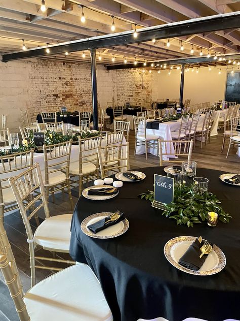 Black Tablecloth Round Table Wedding, Round Tables With Black Tablecloths, Black Round Table Cloth Wedding, Black Table Cloth Decor Wedding Ideas, Round Table Set Up For Party Layout, Wedding With Black Tablecloths, Black Table Clothes Wedding, Black Wedding Table Cloth, Non Floral Centerpieces Wedding