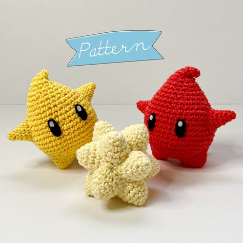 Thank you so much for your interest in my pattern! This is a pdf crochet pattern with detailed instructions on how to crochet this luma with star bit inspired amigurumi. Did you know lumas can transform into galaxies? Do you want to win a 10% discount on this crochet pattern? Send me a message with the answer to the following question that only true gamers know the answer to: What is the colour of the luma inside Mario's hat in Super Mario Galaxy? The first 10 true gamers that send me the right answer will win a 10% discount on this pattern! Are you a beginner? Don't worry! The pattern includes a lot of of clear pictures along the way to guide you through the crochet process. I am sure you will be able to follow along! The crochet stitches used in this pattern are: chain, slip stitch and s Luma Crochet Pattern, Mario Hat, Star Bite, Super Mario Galaxy, Crochet Pattern Amigurumi, Yarn Sizes, How To Crochet, Crochet Patterns Amigurumi, Slip Stitch