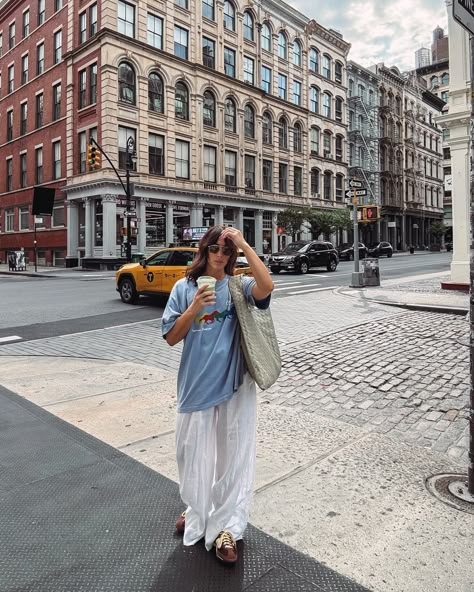 breezy and baggy 🥵❤️‍🔥 . . . . . NYC street style, summer ootd, linen pants, graphic tee, oversized style, sneaker outfits, adidas sl72, Pinterest outfit, casual outfits, Zara style, designer handbag, bottega veneta hop bag Baggy Graphic Tee Outfit, Bottega Veneta Bag Street Style, Baggy Tee Outfit, Oversized Graphic Tee Outfits, Nyc Street Style Summer, Thrift List, Graphic Tee Oversized, Zara Style, Adidas Sl 72