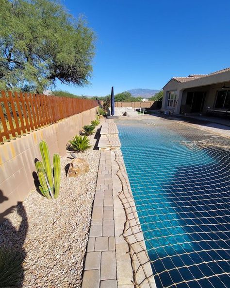 A desert pool with a safety net covering the pool. Pool Safety Net, Pool Nets, Safe Kids, Pool Safety, Pool Fence, The Peace, Your Back, Kids Safe, The Pool