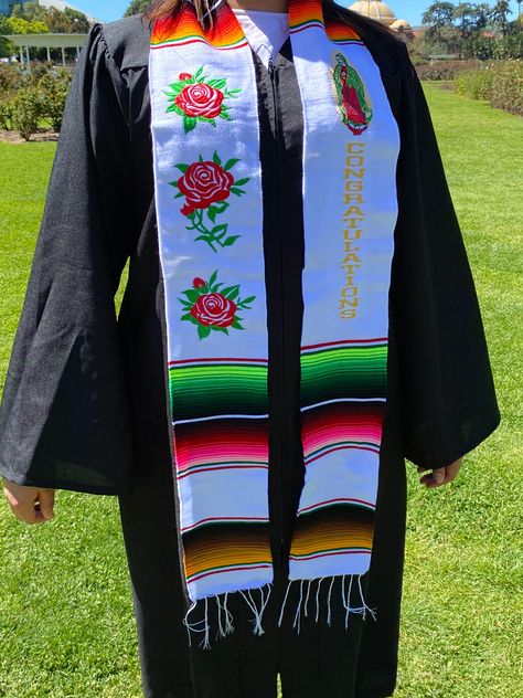 "Beautiful and unique design Mexican United States stole Unisex Limited edition Adult Stole graduacion New design 50% cotton 50% polyester Hermosa estola para graduación Bandera de mexico y Estados Unidos Graduation Stole background with multicolored stripes. These are authentic Mexican serapes woven from acrylic fibers. embroidery stole Beautiful and unique design design Approximate Length: 85\" Length by 5\" Wide" Grad Stole Ideas Mexican, Graduation Mexican Stoles, Grad Stoles, Graduation Attire, Senior Year Fun, Graduation Sash, Mexican Serapes, Graduation Cap Decoration Diy, Graduation Design