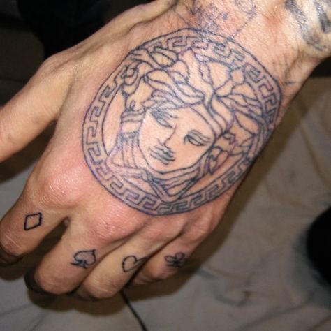 It's art tattoo Hand tattoo  Versace  Tattooing Tattoo Hand, Hand Tattoo, Tattoo Studio, Fish Tattoos, Polynesian Tattoo, Jesus Fish Tattoo, Hand Tattoos, Art Tattoo, Versace