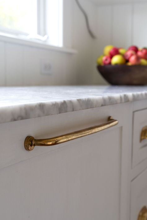 one year of age on our unlacquered brass hardware // the farmhouse kitchen on www.thegritandpolish.com Aged Unlacquered Brass Hardware, Unlacquered Brass Pull, Brass Cabinet Handles Rustic, Classic Brass Kitchen Hardware, Rejuvenation Massey Hardware, White Kitchen Cabinets Transitional, Old Fashioned Cabinet Hardware, Aged Brass Faucet, Brass Hardware White Kitchen