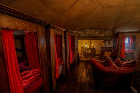 HARRY Potter fans can stay in a Gryffindor themed dorm with four-poster beds and a lavish prefect bathroom, featuring the famous mermaid stained glass window. Found at North Shire in Liverton, on the edge of the North York Moors National Park, the dorms are themed around the famous Hogwarts house common room and dormitory used […] Gryffindor Dorm Room, Gryffindor Dormitory, Harry Potter Dorm Room, Harry Potter Dorm, Gryffindor Dorm, Hogwarts Dorm, Gryffindor Common Room, Hagrids Hut, Cosy Fireplace