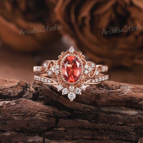 The design inspiration for this ring is akin to unfolding petals, capturing the delicate beauty of a blooming flower. The central gemstone represents the heart of the flower, while the intricate metalwork symbolizes the intertwining vines and leaves. The overall effect is one of timeless romance and natural elegance.🌿🌸 Natural Oval Shaped Sunstone Engagement Ring Set Vintage Leaf Sunstone Ring Unique Orange Gemstone Ring Bridal Set Anniversary Gifts for Her If you want to see more pictures of Sunstone Engagement Ring, 5mm Wedding Band, Sunstone Ring, Anniversary Gifts For Her, Ring Rosegold, Floral Ring, Unique Gifts For Women, Wedding Ring Set, Ring Rose Gold