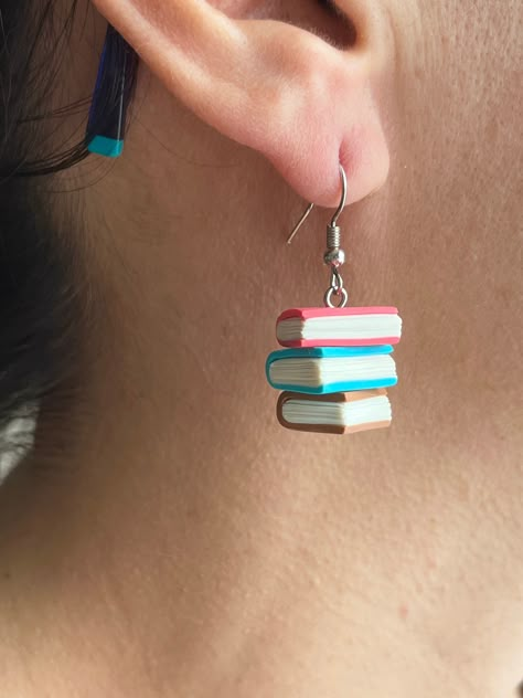 "Book Earrings, Pile of Books Teacher Earrings, Polymer Clay Jewelry, Stack of Books, Fun Dangle Charm Book Lover Earrings, Teacher Gifts, Back to School Gifts. Handmade with love. Unique gift for teachers, students, lawyers, officiants, etc.. Polymer clay earrings measures approx. 0.7\"h x 0.6\"w (18 x 15 mm)  Due to the handmade nature of our products there may be some small variations between each item. We believe this makes each handmade product completely unique. If you have any questions at all, please let me know. Thank you for stopping by." Cute Clay Accessories, Small Clay Things To Make, Fun Earrings Diy, Fun Polymer Clay Earrings, Cute Clay Jewelry, School Earrings, Clay Earrings Cute, Clay Book, Polymer Clay Charms Diy