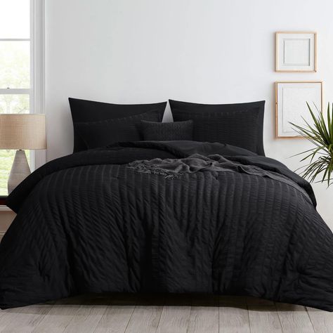 PRICES MAY VARY. Elevate your bedscape with the charming textured touch of our king comforter set - a comforter 102" x 90" and 2 coordinating pillow shams 20" x 36" included. The seamless blend of the seersucker front and brushed microfiber reverse effortlessly combines style and comfort. The 300gsm animal-friendly polyfiber filling has been specifically chosen to strike a balance between warmth and breathability. The lightweight yet fluffy design ensures a cozy feel without the burden of excess Cooling Comforter, Fluffy Comforter, Bed Comforter, Black Headboard, Bed Comforter Sets, Black King, King Comforter Sets, Black Bedding, King Comforter