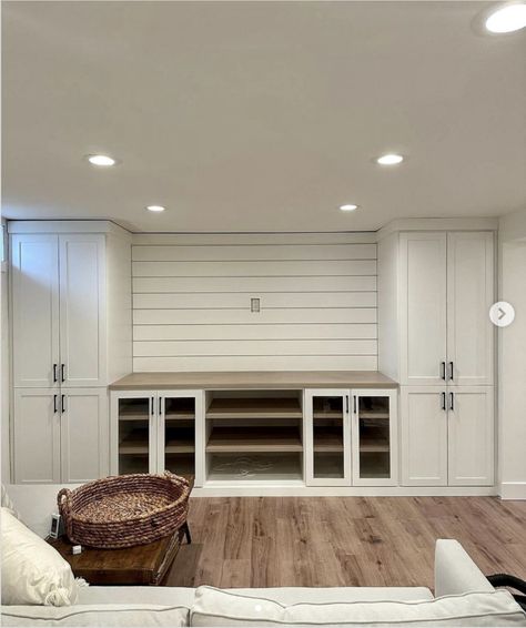 Floor To Ceiling Storage Living Room, Built In Floor To Ceiling Cabinets, Floor To Ceiling Storage Cabinets, Floor To Ceiling Cabinets Living Room, Basement Cabinet Ideas, Wall Of Cabinets Extra Storage, Basement Built In Storage, Condo Aesthetic, Floor To Ceiling Storage