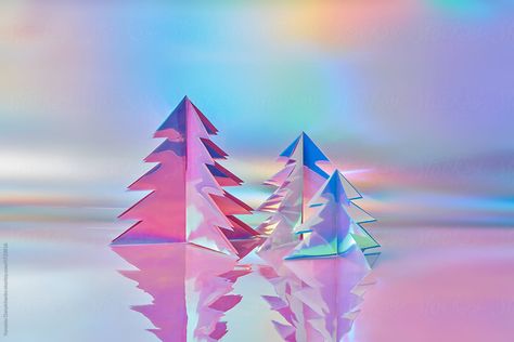 Three different decorative Christmas trees made of trendy holographic foil in studio. Festive atmosphere of aurora borealis. Decorative Christmas Trees, Holographic Christmas, Christmas Poster Design, Holographic Foil, Christmas Poster, Aurora Borealis, Christmas Trees, Aurora, Poster Design