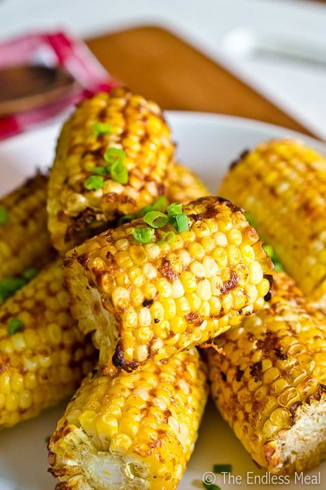 Parmesan Corn, Apple Pie Enchiladas, Lemon Basil Pesto, Masala Corn, Grilling Chicken, Grilled Corn On The Cob, Chicken Steak, Sweet Potato Hash, Baked Banana