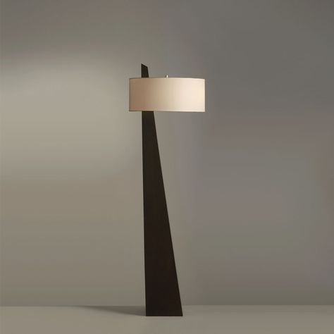 Striking lighting. This floor lamp’s sharply tapered pyramid silhouette brings a bold + angular accent to your space. A beige linen drum shade filters the light and layers in contrasting softness, but it’s set asymmetrically on the body for a final unexpected element. PRODUCT NOTES D 45cm x H 162cm / ∅ 17.7″ x H 63.8″. (59" plug cord) Black, Beige. SKU: RDF-190409 MATERIALS Iron body, fabric lampshade. E26 or E27 socket. (Not included bulbs) PRODUCT SHEET Luxury Floor Lamp, Contemporary Floor Lamp, Large Floor Lamp, Iron Body, Contemporary Floor Lamps, Fabric Lampshade, Black Floor Lamp, Living Room Flooring, Coimbatore