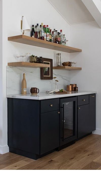 Bar Shelves Lights, Industrial Dry Bar, Dining Room Mini Bar, Mini Bar In Dining Room Ideas, Bar Cabinet With Shelves Above, Black Cabinet Wet Bar, Floating Shelf Bar Ideas, Ikea Dry Bar, Shelves Above Bar