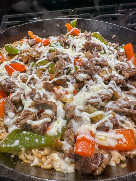 Philly Cheesesteak Rice Skillet - Cooking with Katie Cross Philly Cheese Steak Rice Skillet, Mexican Steak And Rice Recipes, Philly Cheese Steak Casserole With Rice, Philly Cheese Steak Rice Bowls, Philly Cheesesteak Rice Bowl, Steakums Recipe Ideas, Dinner Recipes With Steak, Philly Steak Recipes, Steak And Rice Recipes