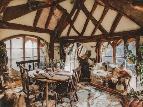 Vintage Style Photography Hobbits style room with coffee 1 Hobbit Aesthetic Home Decor, Hobbit House Aesthetic, Hobbit Home Decor, Hobbit Living Room, Hobbit Lifestyle, Fairy Tail Cottage, Cozy Room Decor Ideas, Hobbit House Interior, Vintage Style Photography