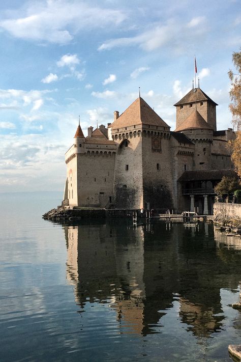 reflection of Chillon castle in the Lake Geneva, Montreux, Switzerland Montreux Switzerland Aesthetic, Chillon Castle, Montreux Switzerland, Architecture Aesthetic, Sweet Lover, Dream Places, Slow Travel, Lake Geneva, Tower Bridge