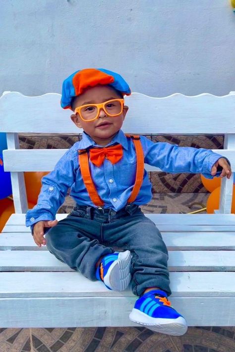 little boy wearing a Blippi halloween costume and sitting on a bench. he is ready for halloween with his blue shirt, orange suspenders, orange glasses, orange bowtie and Blippi hat and shoes! so fun! Blippi Halloween Costume, Blippi Costume, Roman Costume, Toddler Parties, Toddler Costumes, Toddler Halloween, 3rd Baby, 2nd Birthday Parties, Halloween Costumes For Kids