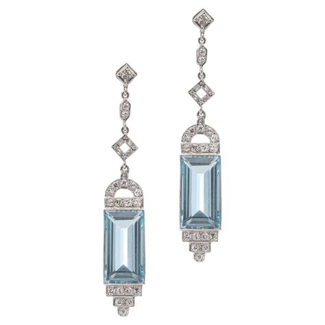 Art Deco 850. Platinum pair of A dangle earrings with Aquamarines and Diamonds. Made in Europe, Ca. 1930's X-Ray tested positive for 850. Platinum. * Please note: customs and import charges may apply for international buyers, bidders are responsible for any customs duties fees. Dimensions - Length x width x depth: 5.5 x 1 x 0.7 cm Weight: 9.00 grams Aquamarines - Quantity: 2 Cut: Elongated Step - cut Approx. Carat weight: 2 x 11.00 carats Total carat weight: 22.00 carats in total Diamonds - Cut: 1930s Earrings, Zircon Earrings, Aquamarine Earrings, Step Cut, Authentic Jewelry, Art Deco Earrings, Art Deco Diamond, Diamond Drops, Diamond Drop Earrings