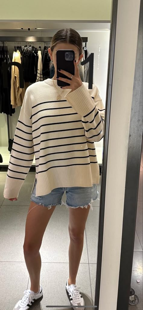 Girl standing in Zara store in mirror. Swearing white and blue striped sweater and jean shorts. Striped Sweater Outfit Summer, Fall Coastal Granddaughter, Coastal Grandma Sweater, Coastal Grandmother Sweater, Sporty Coastal Outfit, Coastal Granddaughter Sweater, Costal Granddaughter Outfit Fall, Costal Grandma Aesthetic Outfits Fall, Coastal Grandmother Aesthetic Outfits Fall