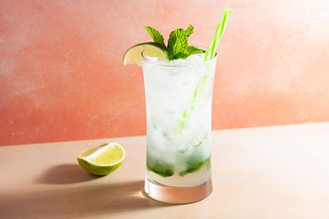 Skip the rum and mix up a refreshing vodka mojito instead. Featuring the original cocktail's fresh mint and lime, this recipe is just as easy and fun. Mojitos Recipe, Vodka Mojito, Simple Syrup Cocktails, Light Drinks, Citrus Vodka, Recipe For Summer, Mint Simple Syrup, Sweet White Wine, Refreshing Summer Cocktails