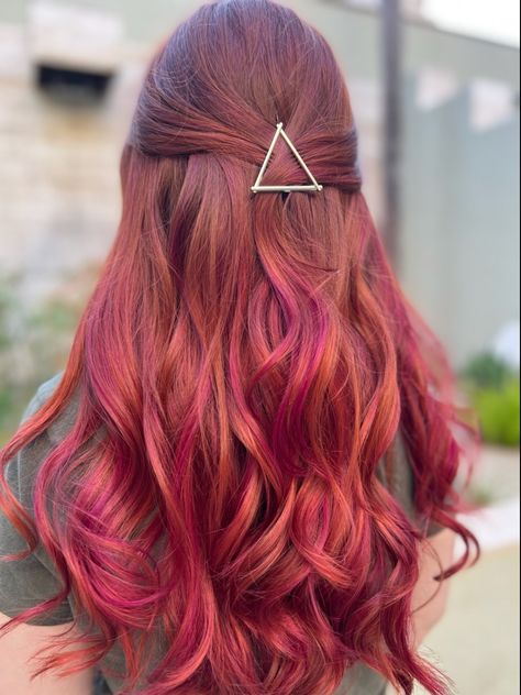 A girl with copper red hair and hot pink highlights. There are curls in her hair and is pulled back in a half updo with a triangle hairpin. Red Hair With Peekaboo, Red Hair With Pink Highlights, Pink Peekaboo Hair, Strawberry Red Hair, Red Purple Hair, Pink Hair Highlights, Peekaboo Hair Colors, Purple Hair Highlights, Copper Red Hair