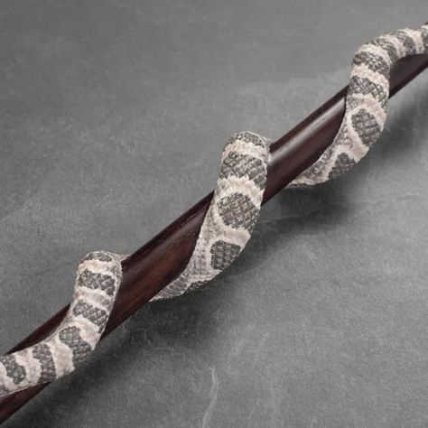 Hand-Painted Rattlesnake Walking Cane – Unique Wooden Carved Snake Walking Stick – MedGear Express https://medgearexpress.com/product/hand-painted-rattlesnake-walking-cane-unique-wooden-carved-snake-walking-stick/ #HandPaintedCane #RattlesnakeWalkingCane #UniqueWoodenCane #SnakeWalkingStick #MedGearExpress #handpaintedrattlesnakecane #carvedsnakewalkingstick Custom Walking Sticks, Cool Walking Canes, Wood Staff, Unique Walking Sticks, Fashionable Canes, Cane Tips, Rattle Snake, Coiled Snake, Wooden Canes