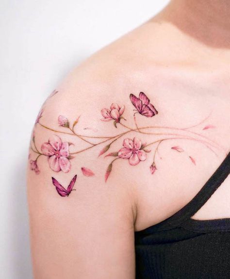 61 Beautiful Cherry Blossom Tattoos With Meaning - Our Mindful Life Pretty Butterfly Tattoo, Cherry Blossom Tattoo Shoulder, Cherry Blossom Tattoos, Flower Tattoo On Ribs, Cherry Blossom Tree Tattoo, Blossom Tree Tattoo, Sakura Tattoo, Floral Tattoo Shoulder, Flower Wrist Tattoos