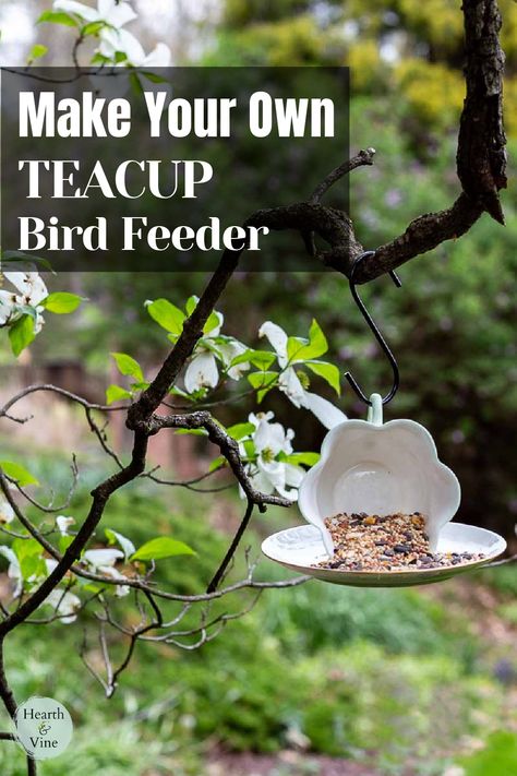 Fluted teacup on its side resting on the saucer filled with birdseed hanging in a tree. Teacup Bird Feeder Diy, Tea Cup Projects, Teacup Bird Feeder, Suet Bird Feeder, Outdoor Hacks, Teacup Crafts, Garden Kids, Window Bird Feeder, Homemade Bird Feeders