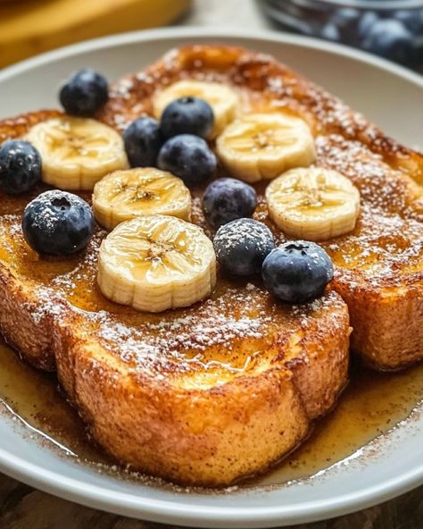 Banana Cinnamon French Toast Bake: A warm, comforting dish combining the classic flavors of banana, cinnamon, and French toast—perfect for a cozy breakfast or brunch! Ingredients: - 1 loaf of French bread, cubed - 4 large eggs - 1 ½ cups milk - ½ cup heavy cream - ⅓ cup granulated sugar - 2 teaspoons ground cinnamon - 1 teaspoon vanilla extract - 3 ripe bananas, sliced - 2 tablespoons butter, melted - Maple syrup, for serving Instructions: 1. Preheat oven to 350°F (175°C). Grea... Cozy Baking, Cinnamon French Toast Bake, Fun Foods To Make, Banana French Toast, Cozy Breakfast, Cinnamon French Toast, French Toast Bake, Ripe Bananas, Edible Food