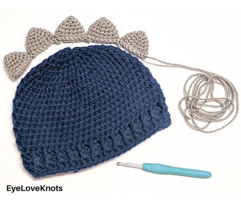 Double Knotted Crochet's Dinosaur Spike Hat - Free Crochet Pattern - EyeLoveKnots Boy Crochet Hat Free, Crochet Dinosaur Beanie Pattern Free, Crochet Hat Dinosaur, How To Crochet Dinosaur Spikes, Crochet Dinosaur Spikes Free Pattern, Crochet Baby Dinosaur Hat Free Pattern, Crochet Toddler Boys Hat Free Pattern, Dino Crochet Hat, Dino Hat Crochet