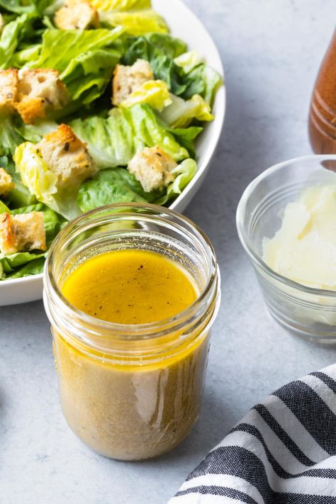 Skip the heavy, creamy dressing and make this easy, Caesar vinaigrette instead. This homemade caesar salad dressing recipe only takes a few minutes and contains no raw egg. Plus, it’s healthy, dairy free and paleo friendly so you can enjoy it whenever you want. Caesar Vinaigrette, Dairy Free Caesar Dressing, Easy Caesar Salad Dressing, Caesar Salad Dressing Recipe, Caesar Dressing Recipe, Homemade Caesar Salad Dressing, Homemade Caesar, Salad Dressing Recipe, Vinaigrette Salad