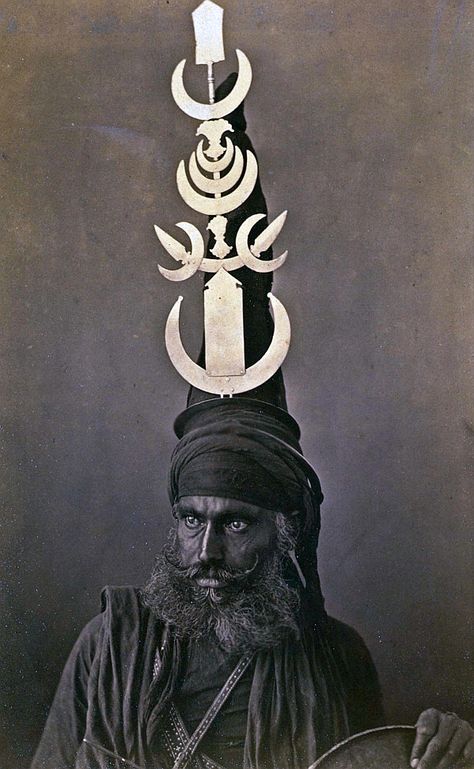 Akali Sikh warrior wearing the distinctive Akali turban, India, about 1860.  The Akali army was called the Akal Sena or Akal Fauj but was informally known as the Budha Dal or army of Baba Budha Ji. Its primary function was to defend Sikhism and all who sought the protection of the Sikhs from the then oppressive Mughal empire which had tortured and executed the fifth Guru, Arjandev. It was his son, Akali Guru Har Gobind,  who engaged the Mughal forces in four battles and gained four victories. Sikh Warrior, Weird History, Arte Yoga, Vintage India, Dark Arts, Perfect Gif, Historical Images, We Are The World, Foto Art