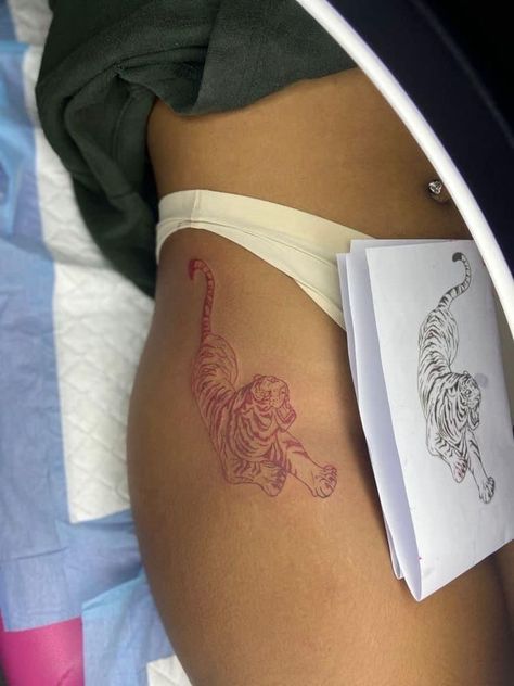 Pretty Tattoos For Women Stomach, Red Tiger Tattoo On Back, Tiger Tattoo On Hip For Women, Baddie Snake Tattoo, Red Tiger Tattoo For Women, Tiger Tattoo For Women Hip, Tiger Tattoo Red Ink, Red And Black Tiger Tattoo, Tiger Tattoo On Hip