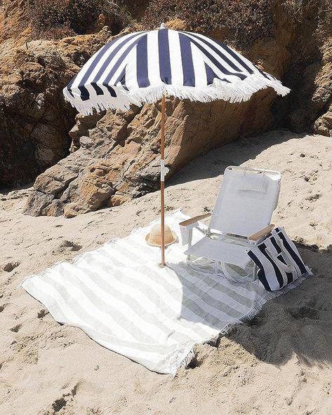 Introducing the Holiday Umbrella, our boho beach umbrella that’s perfect for your next day in the sun. Features the B&P Co. signature white fringe that adds a beautiful vintage look to your beach setup. The UV resistant, 5' canvas canopy blocks out 98% of UV rays providing you with UPF 50+ protection. Features an adjustable aluminum pole hinge & World Forestries certified 1” Eco Timber wood pole. Boho Outdoor, Reclaimed Timber, Fabric Colour, Holiday Beach, Beach Umbrella, Outdoor Umbrella, Patio Umbrellas, Wood Laminate, Beach Picnic