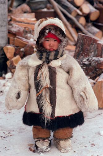 Russia | Small Chukchi child in traditional fur clothing. Chukotka, Siberia,Russia | Photo by zalikopanjikidze on flickr Siberia Russia, Traditional Culture, Kids Around The World, Fur Clothing, Winter Cold, Cold Hands, Snow Queen, Folk Costume, World Cultures