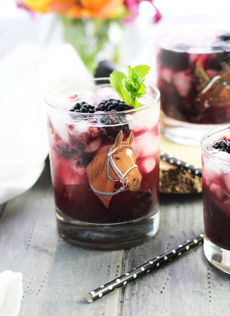 Put on a fancy hat, sip one of these delightful Blackberry Mint Juleps and transform yourself straight to the Kentucky Derby.  These quintessential drinks are so refreshing and a touch of fresh blackberry is such a welcome addition to a perfect medley of flavors.  Load it up with plenty of crushed ice and a sprig of fresh...Read More » Blackberry Iced Tea, Cold Green Tea, Blackberry Tea, Cold Brew Iced Tea, Vegan Drinks Recipes, Mint Juleps, Making Iced Tea, Healing Tea, Fresh Fruit Juice